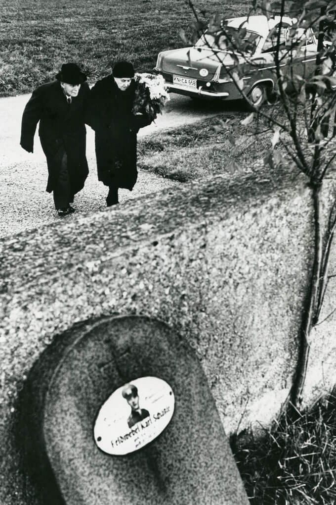 Elderly couple walking in cemetery, W. Germany, 1966